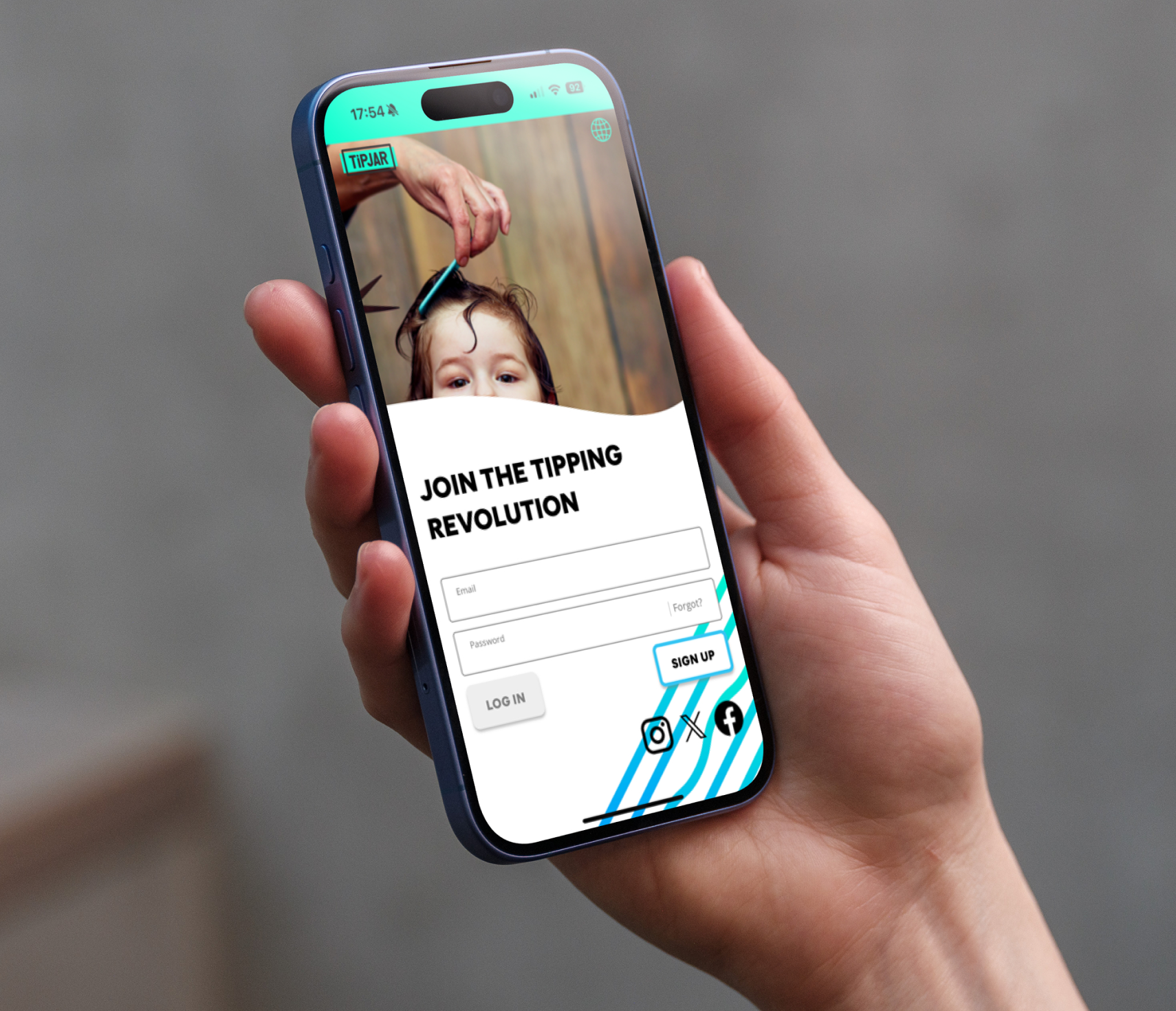 A hand holds a smartphone displaying the TiPJAR app’s login screen. The screen reads “Join the tipping revolution” with fields for email, password, and log in or sign up buttons.
